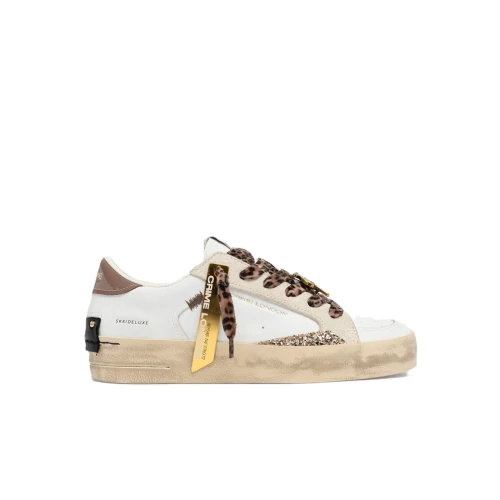 CRIME LONDON - Sneakers bianca e animalier con charms -